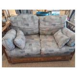 Rattan and upholstered loveseat 54' L 36 D 32' T
