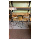 2 Metal Stools. One has a back. Backed us 41 In H