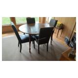 Table with 4 upholstered chairs