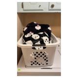 Comforters with Ghost on & Clothes basket