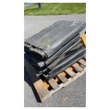 Four pieces of large roofing rubber