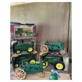 6-John Deere die cast tractors & Steering wheel
