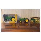 2 Ertl John Deere Tractors & 1 other