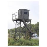 Hunting stand with cabin