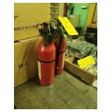 TWO FIRE EXTINGUISHERS