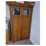 TWO DOOR WOODEN CABINET W/ GLASS INSETS