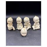 4 Porcelain Kewpie Dolls