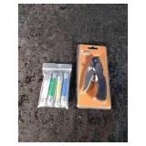 Ozark Trail Pocket knife and 4 Small Pocket knives