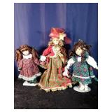 3 Porcelain Christmas Dolls