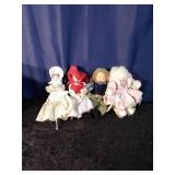 Lot of small Porcelain and cloth dolls
