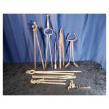 7 Sets Of Black Smith Tongs.