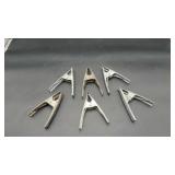 Five Metal Clamps