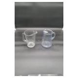 2 Clear Glass Pitchers