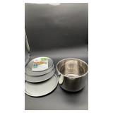 4 pizza pans and a large pot