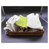 Multiple Oven Mitts and Kitchen Towells