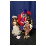 Two Porcelain and One Plastic Doll