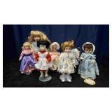7 Porcelain Dolls and Stands