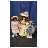 3 Porcelain Dolls with Stands
