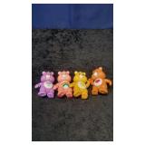 Four Carebear Figurines