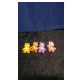 Four Carebear Figurines