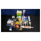 Box of Wood Stains and Caulk