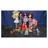 Eight Doll Figures & Accessories
