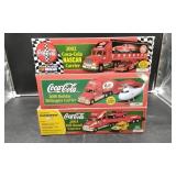 3 Coca Cola Racing Car Carriers With Box.