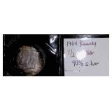 1964 Kennedy Half Dollar in protective cover