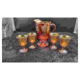 Orange Carnival Glass Pitcher & Four Goblets