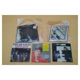 Five 7 Inch vinyl Records