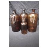 4 Amber Apothecary Bottles.