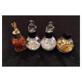 4 Souvenir Globes With Various Metal Flakes