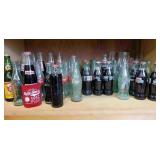 Shelf Of Various Soda Bottles