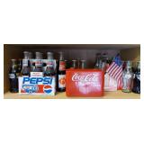 Shelf Of Pepsi & Coca Cola Bottles