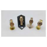 4 Gold-Toned 'Timex' Watches