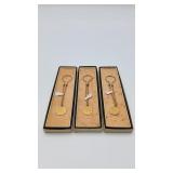 3 'Simmons' Gold Toned Fobs