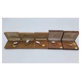 5 'Simmons' Gold-Toned Key Rings
