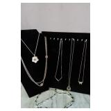 Various Gold-Toned Necklaces