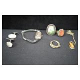 Watch, Cufflinks, Necklace, Rings.