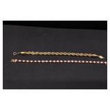 2 Gold Tone Bracelets