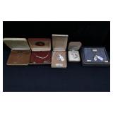 4 Necklaces and one Earring set
