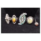 4 Statement rings with various stones