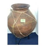 Clay pot on stand-16'tall