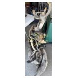 Skunk on tree base-44'tall,36ï¿½long