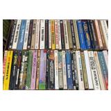 Various paperback books