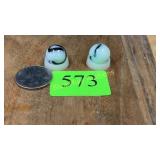 2 oxblood marbles