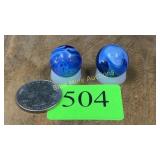 2 slag glass marbles
