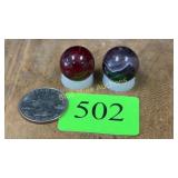 2 slag glass marbles
