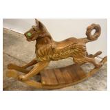 Carved rocking dog-33'tall,13'deep.55'long