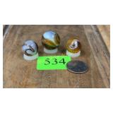3 slag glass marbles